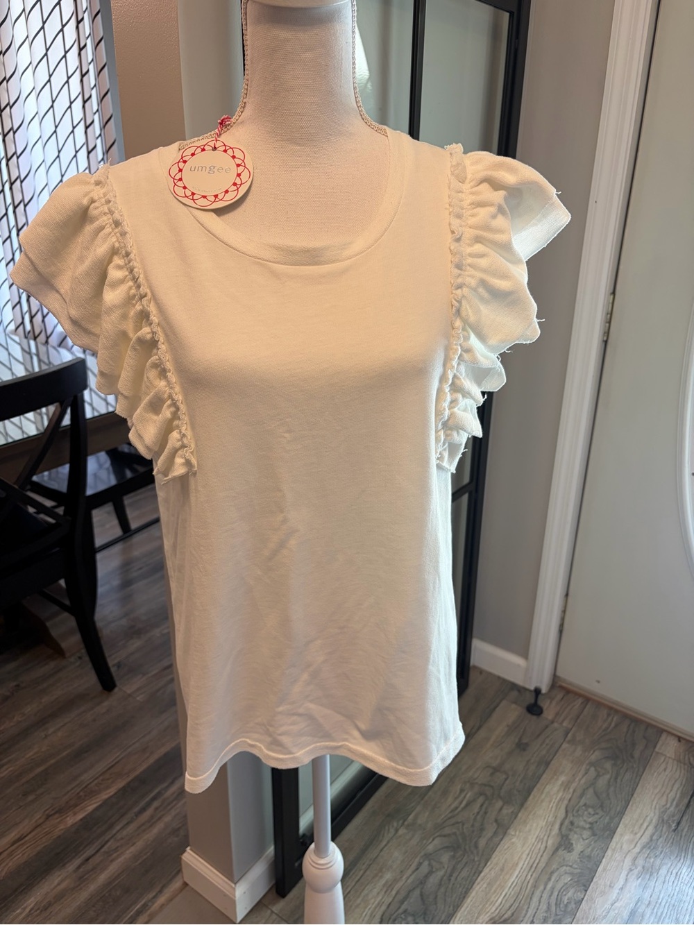 New With Tags…Boutique Umgee…Size Medium(loose fit)…Ruffle Sleeve Knit Top